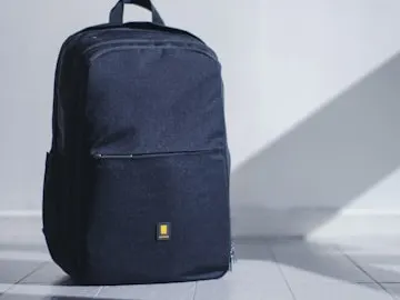 Black camera backpack with padded compartments